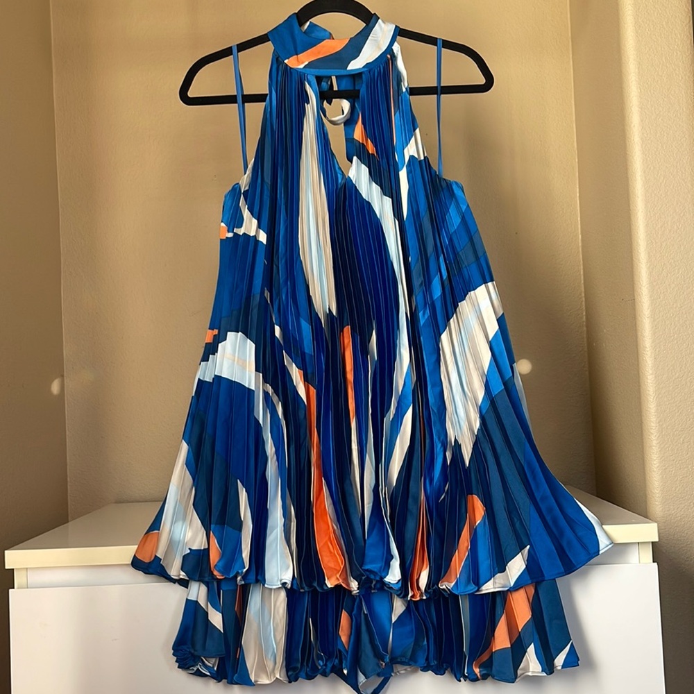 Anthropologie Hutch Halter Pleated Romper in color Blue motif. Size small, NWT.